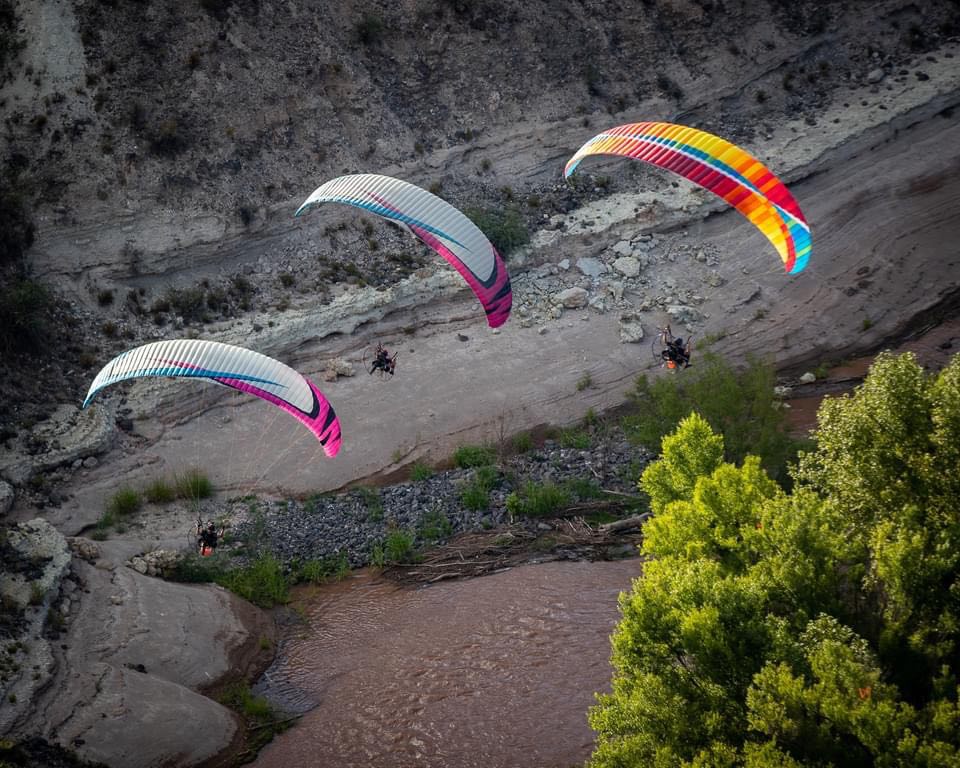 Paramotor pilots flying canyon Arizona